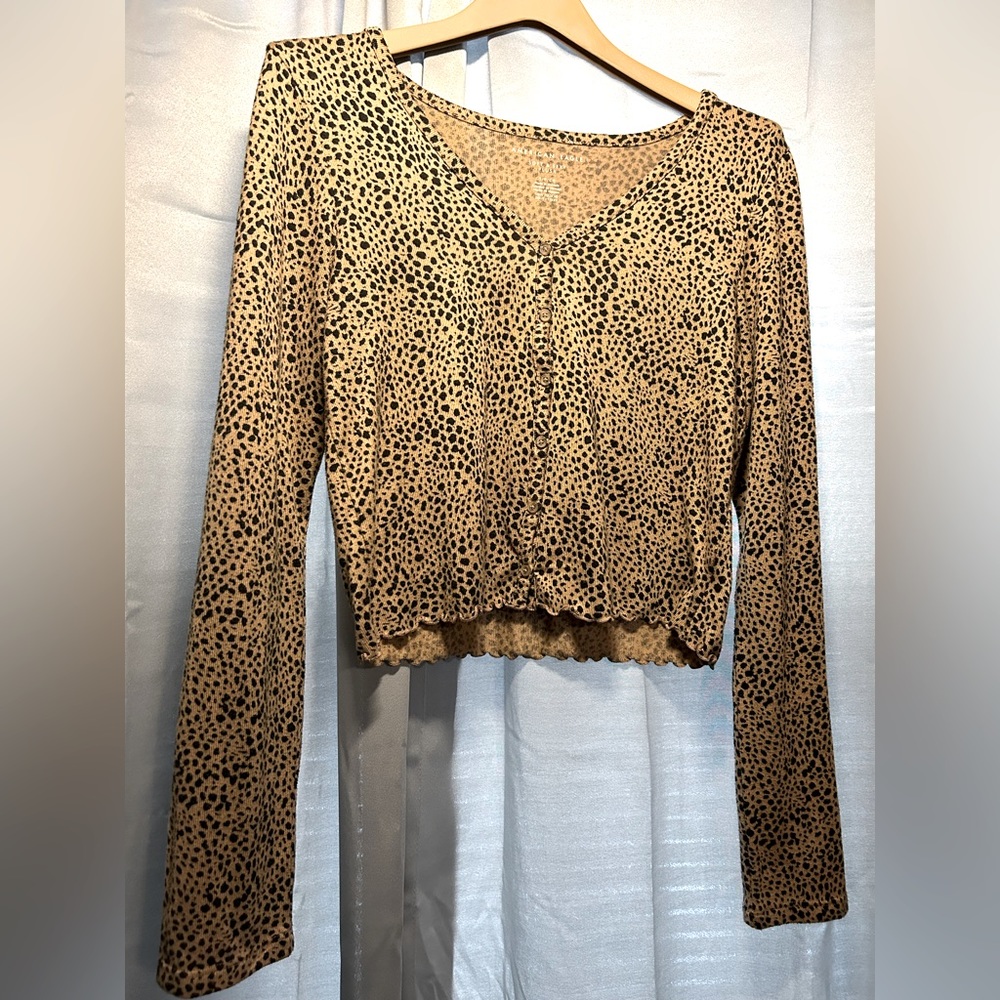 Beautiful Cheetah print waistline shirt.  Size Small